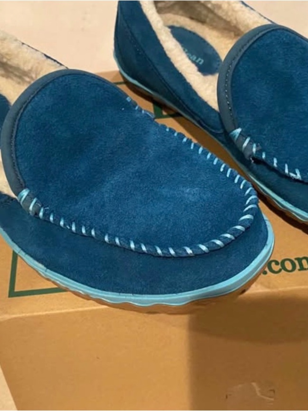 Woman’s size 6 Blue Suede Cozy Moccasin Slippers